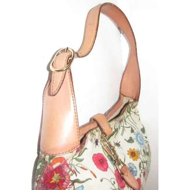 RARE, Gucci, unique, flora design fabric and nude leather, 1961 Jackie hobo style purse with vibrant colors, a gold piston closure