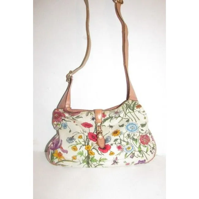 RARE, Gucci, unique, flora design fabric and nude leather, 1961 Jackie hobo style purse with vibrant colors, a gold piston closure