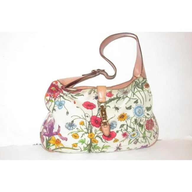 RARE, Gucci, unique, flora design fabric and nude leather, 1961 Jackie hobo style purse with vibrant colors, a gold piston closure