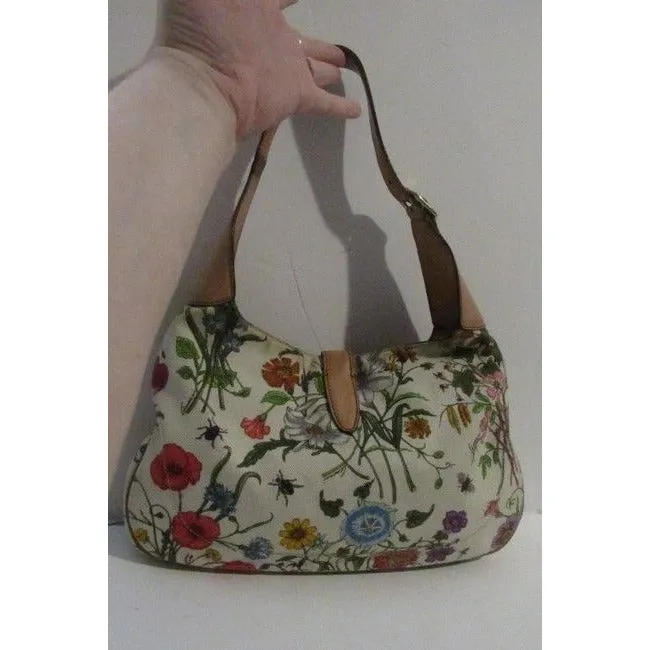 RARE, Gucci, unique, flora design fabric and nude leather, 1961 Jackie hobo style purse with vibrant colors, a gold piston closure