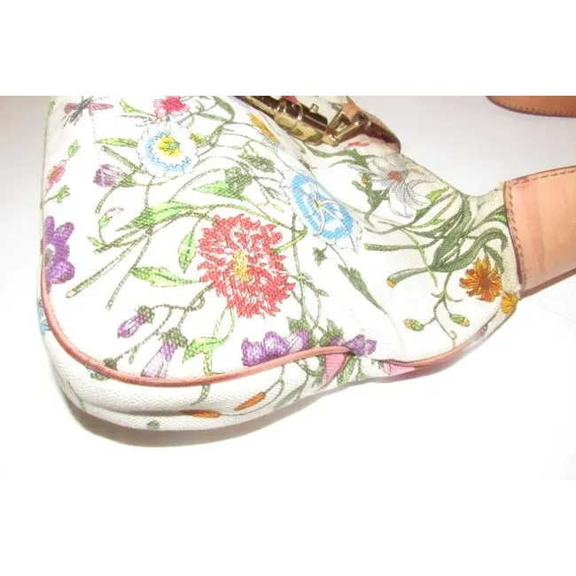 RARE, Gucci, unique, flora design fabric and nude leather, 1961 Jackie hobo style purse with vibrant colors, a gold piston closure