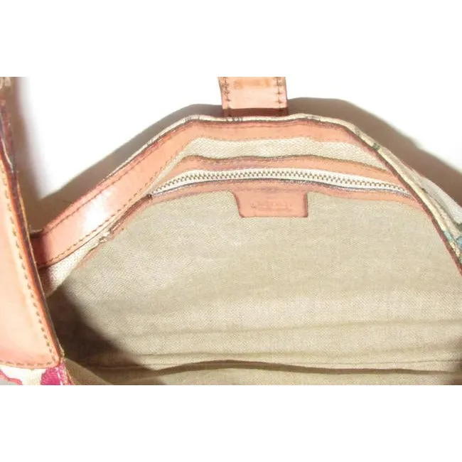 RARE, Gucci, unique, flora design fabric and nude leather, 1961 Jackie hobo style purse with vibrant colors, a gold piston closure